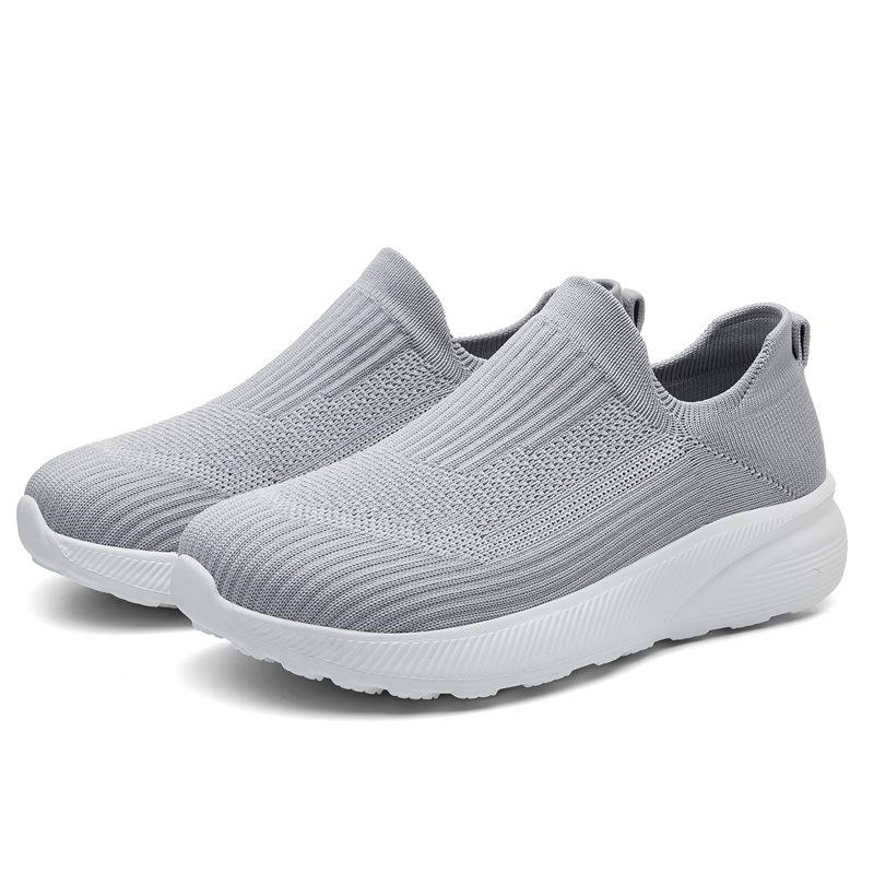 Spring new wide sole breathable cloth shoes large size sports and leisure shoes flying woven shoes lazy shoes