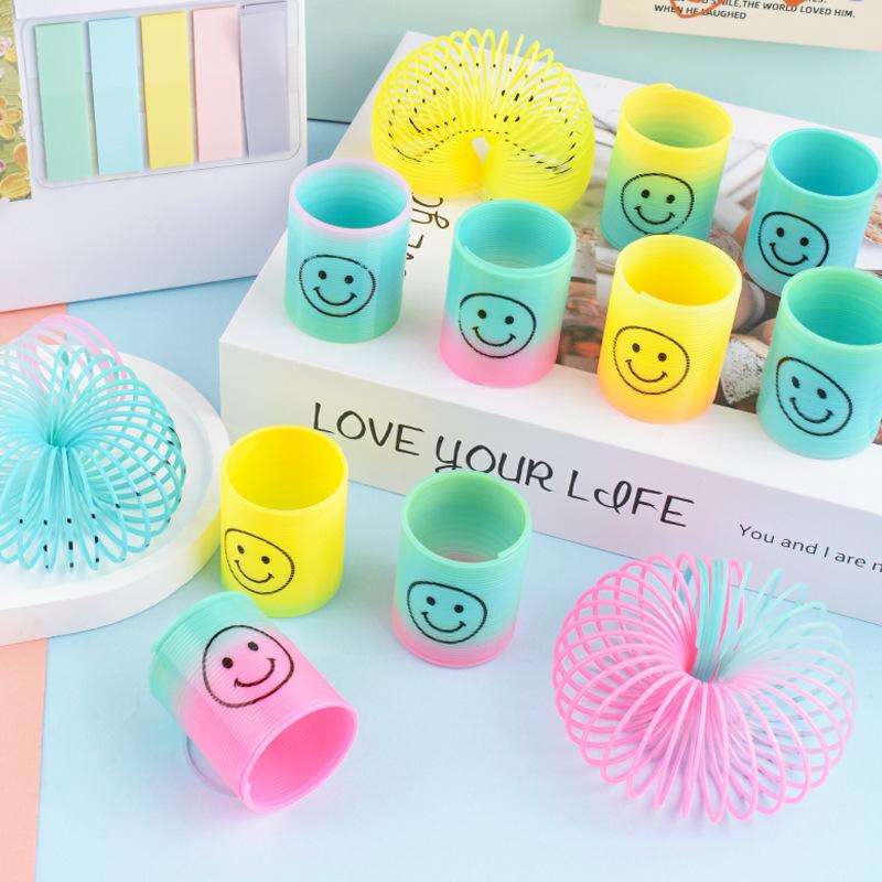Kids' Colorful Smiling Rainbow Coil Toy - Elastic Spiral with Seven Colors for Street Stall Prizes