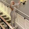 K23JP291 Women's Autumn/Winter 2023 Knitted Sleeve Cutout Jumpsuit with Baggy Pants