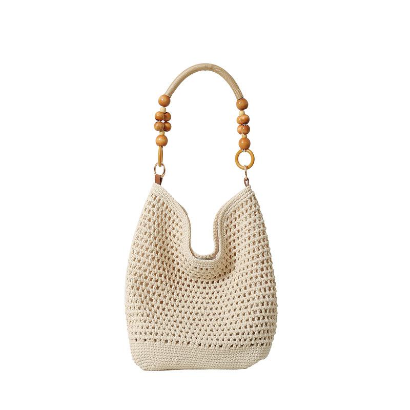 Stylish large-capacity knitted hollow women's tote bag, new exquisite beach vacation hand-woven shoulder bag