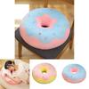 Almofada de pelúcia em formato de donut, fofa e ideal para decoração de casa e assento confortável.