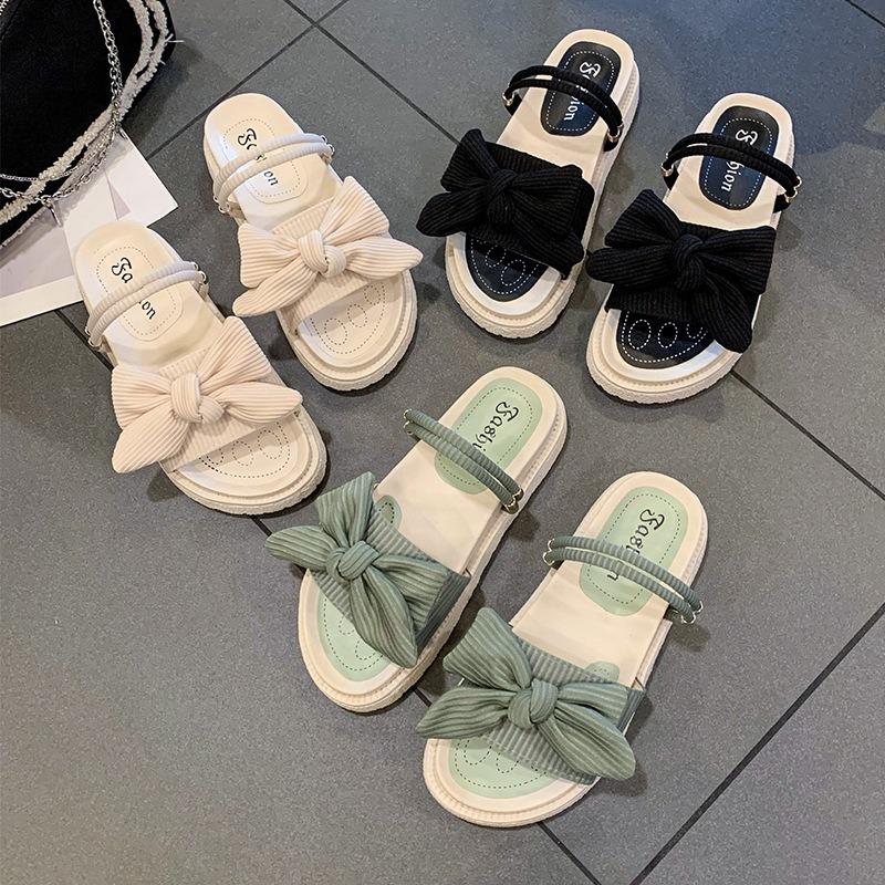 Two wearing sandals female summer flat-bottomed fairy fashion new student fashion thick-soled beach cool slippers