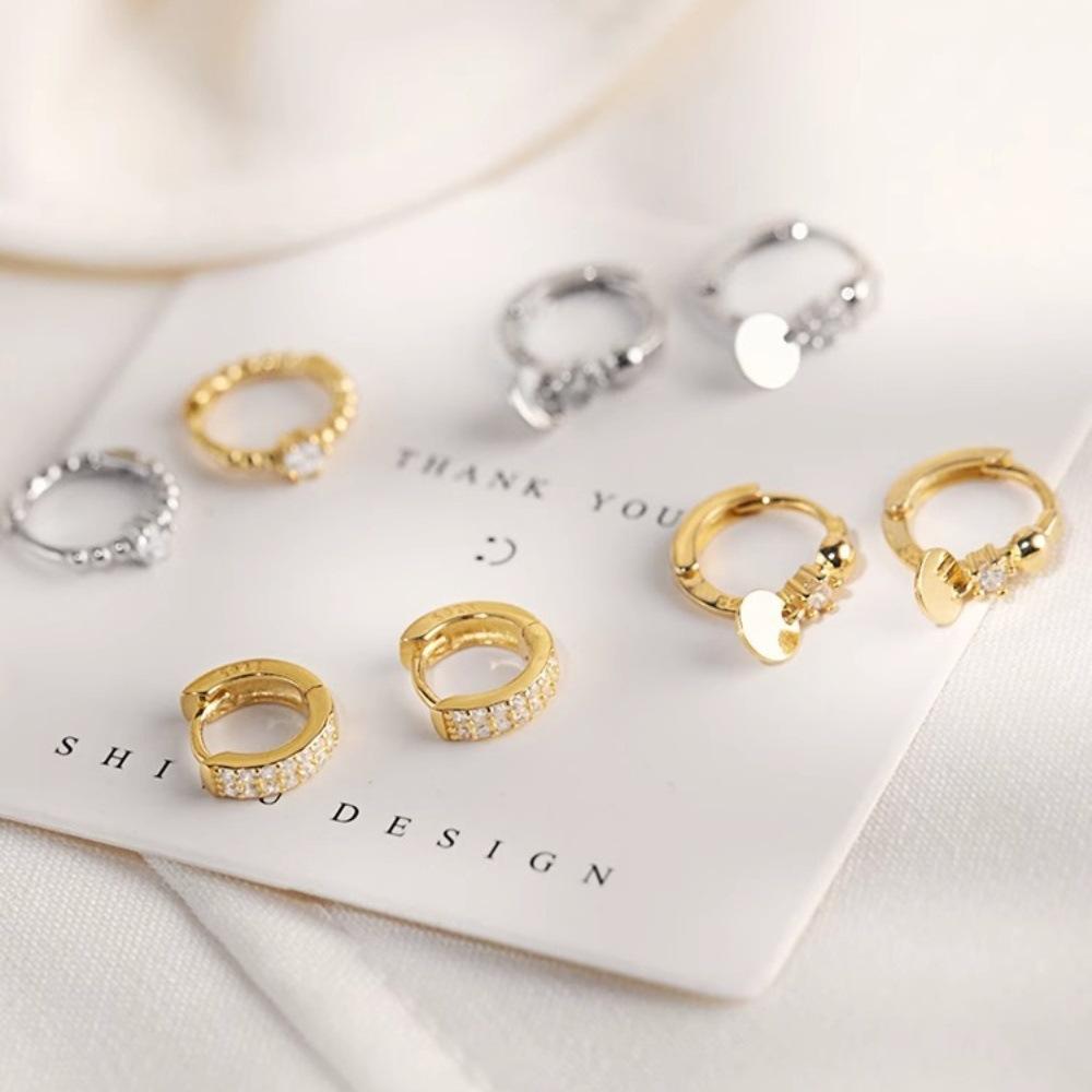 Korean version of small disc earrings, simple personality, micro-inlaid ear buckles, small temperament, ear hole earrings