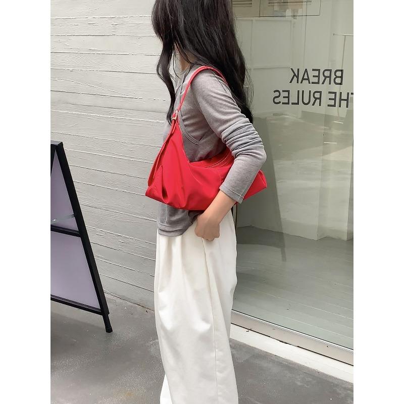 

New bag women s bag lazy style simple portable shoulder bag women s zipper nylon commuter armpit bag красный