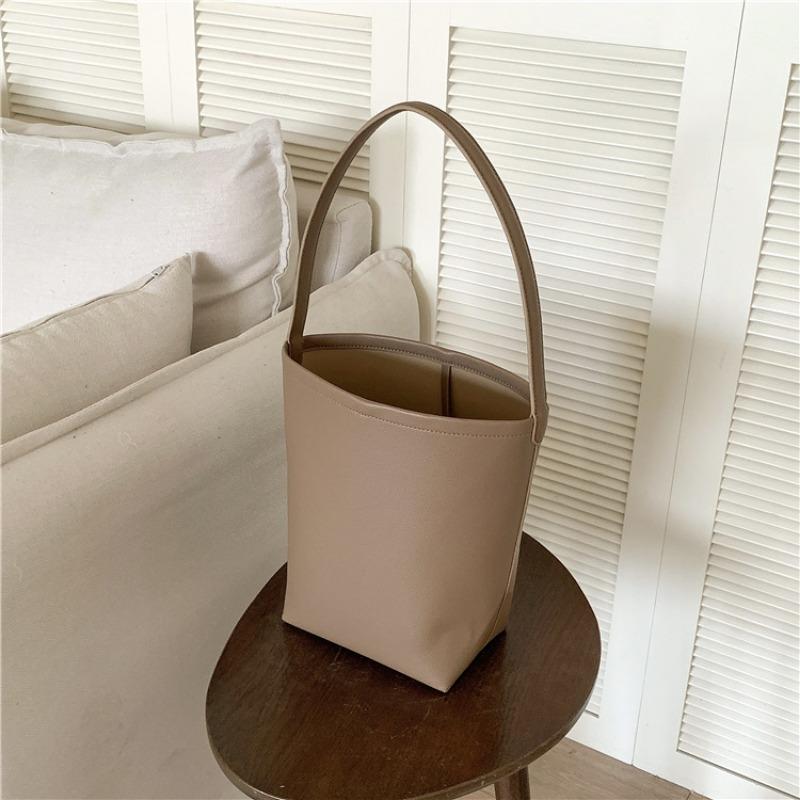 Bucket bag logo shoulder bag large capacity high sense solid color simple leather cylinder mother and child bag