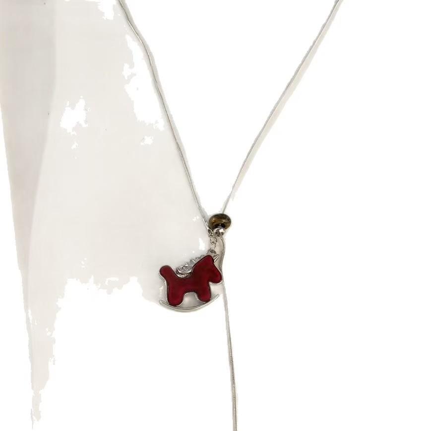 Flash zirconium coffee color Trojan horse pendant can pull necklace women's niche design long high-end wooden pony sweater chain