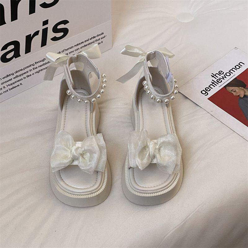 Pearl one-word buckle non-slip with skirt Roman shoes women's 2025 new summer muffin platform bow sandals
