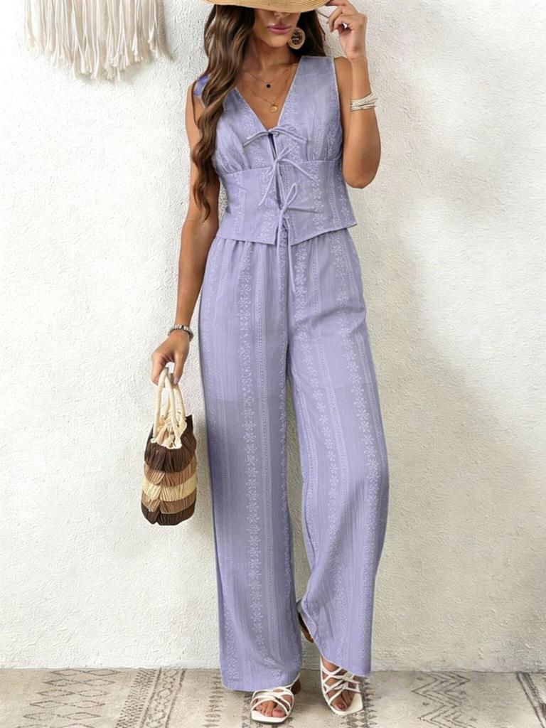 Sleeveless V-Neck Romper Shorts with Floral Print and Tie Detail in Light Blue