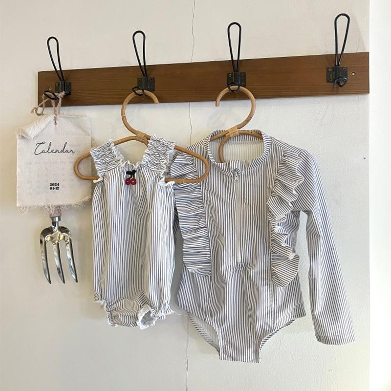 

Стильный серый слитный купальник-слинг для девочек 2025 130 cm