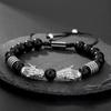 A men's handmade beaded braided bracelet, leopard head vintage jewelry suitable for men's daily wear
