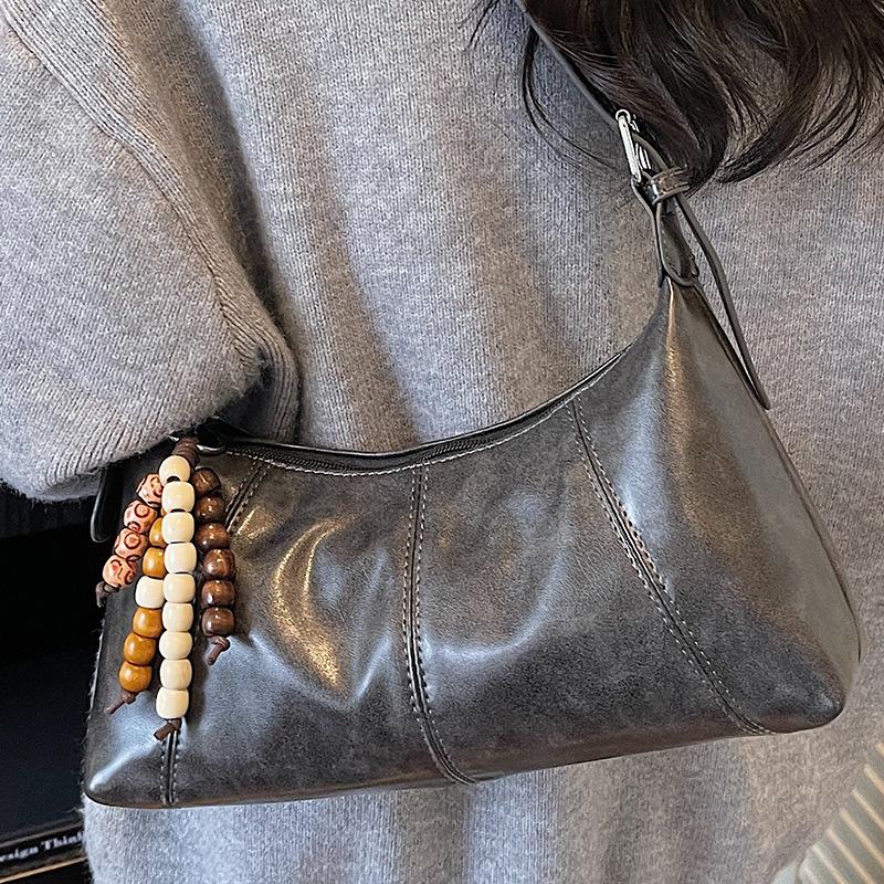 Einfache Unterarmtasche Damen neue Herbst Retro Mode Umhängetasche tragbare Messenger Freizeitpendlertasche
