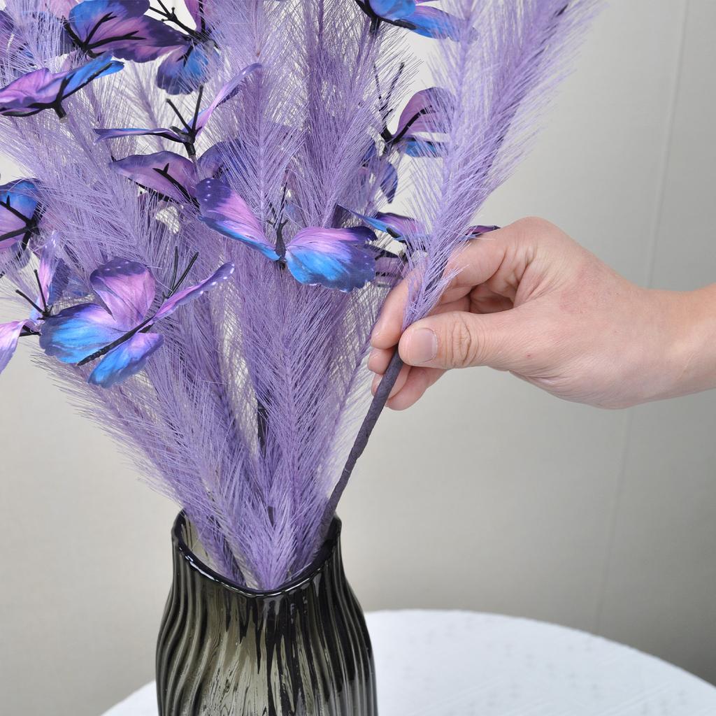 An artificial butterfly branch used for weddings, family offices, parties, decorating vases, and floral arrangements