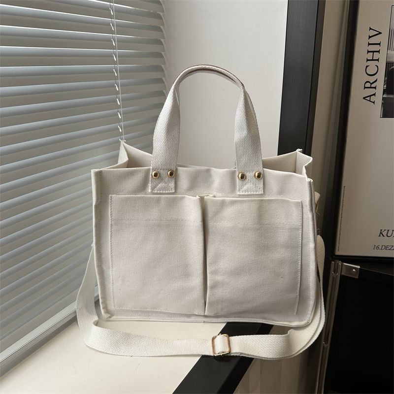 Tote bag 2025 new college student versatile fashion shoulder bag Korean version of simple large-capacity canvas messenger bag