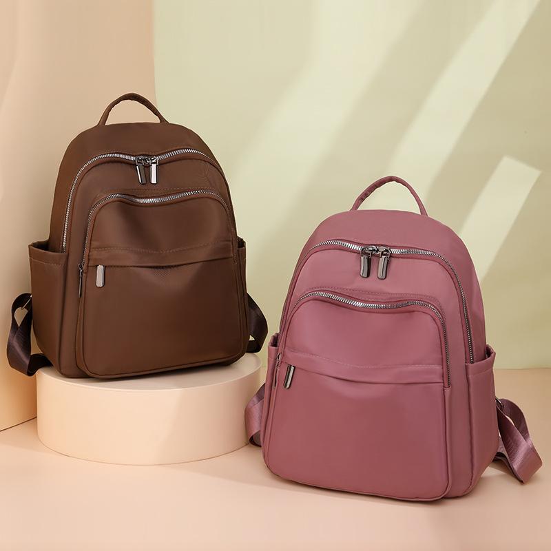 Simple and atmospheric backpack, durable travel, going out schoolbag, fashionable and versatile student 2025 new large-capacity bag