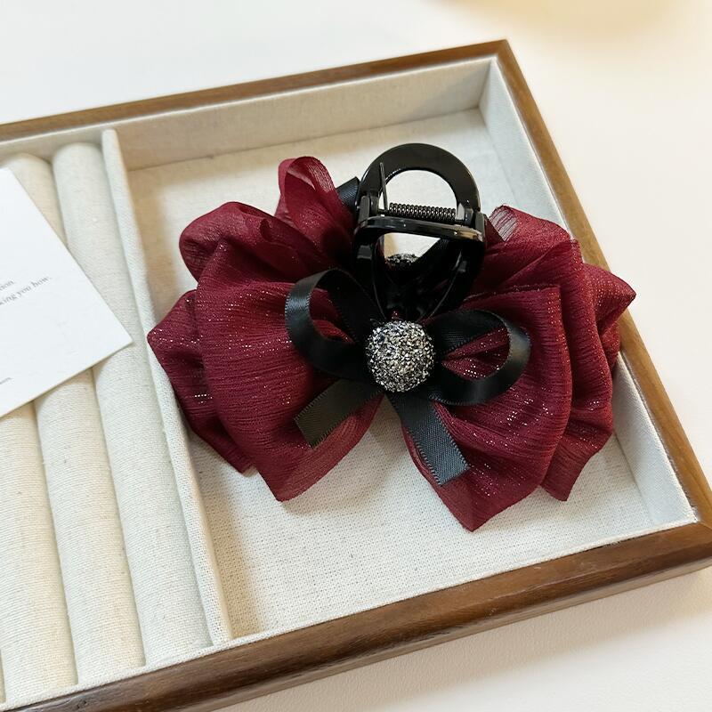 

Елегантна атласна чорна шпилька-бант для волосся зі стразами - жіночий аксесуар-краб