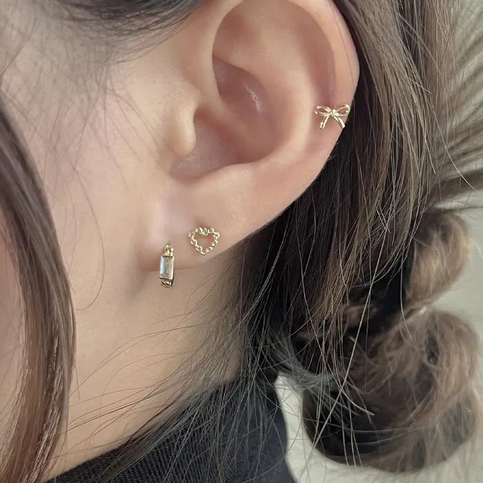 14k chain heart piercing