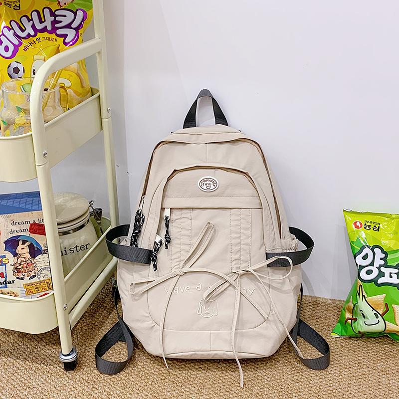 

Корейский студенческий рюкзак для отдыха, женский, новый, милый, большой вместимости, из нейлоновой ткани, однотонный, маленький, свежий, рюкзак для компьютера. .