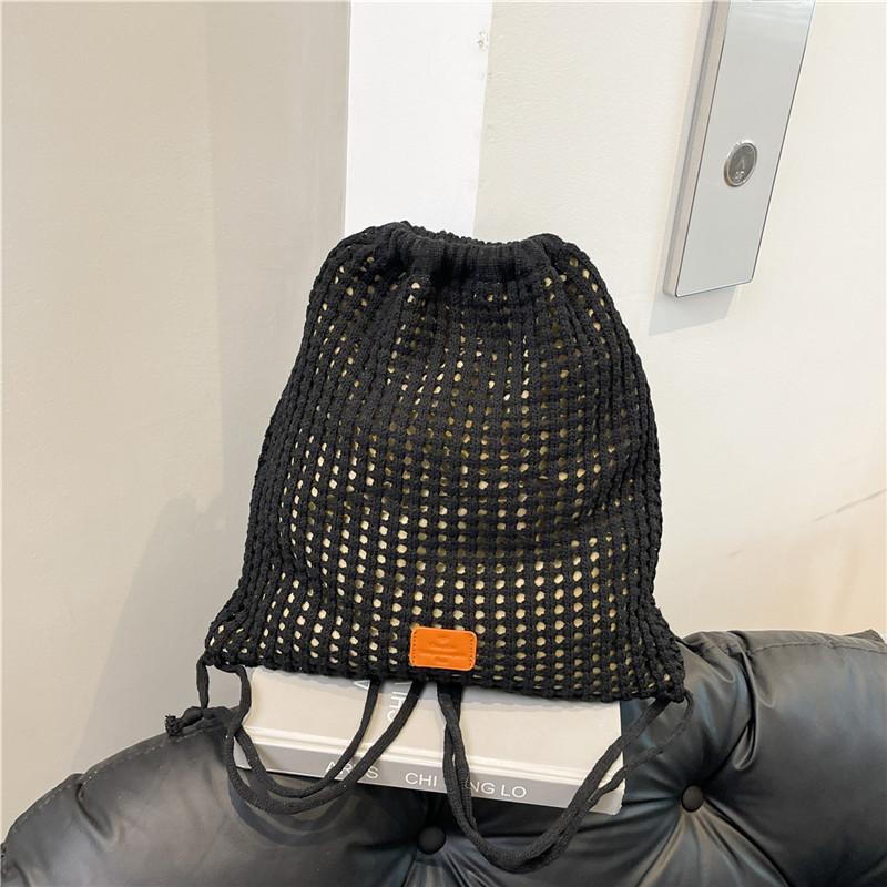 

Knitted pump with bucket backpack, new seaside going out hollow flower vacation wind back shoulder bag чёрный