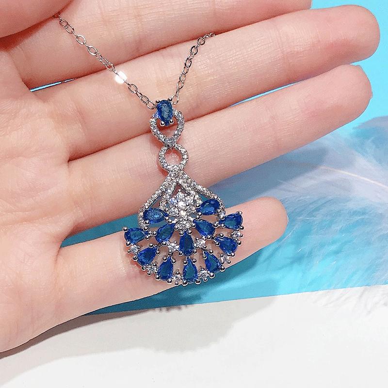 Fan Shaped Pendant Necklace with Deep Blue and Clear Stones Ornate Statement Jewelry for Women
