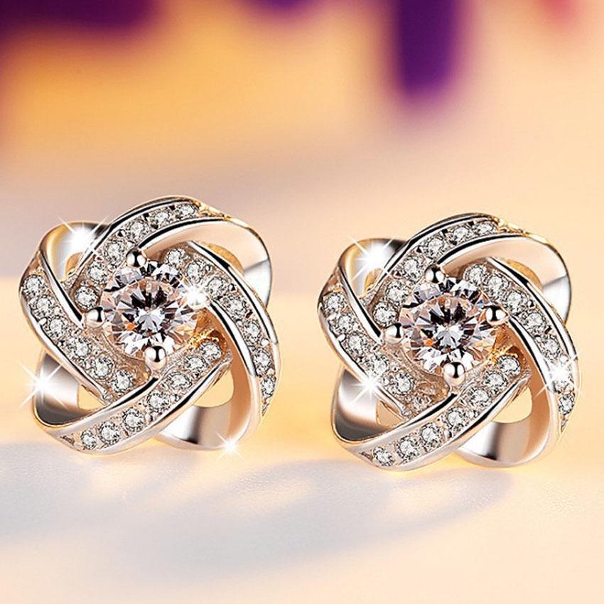 

Серьги-цветы с бриллиантами и стразами - Элегантные украшения