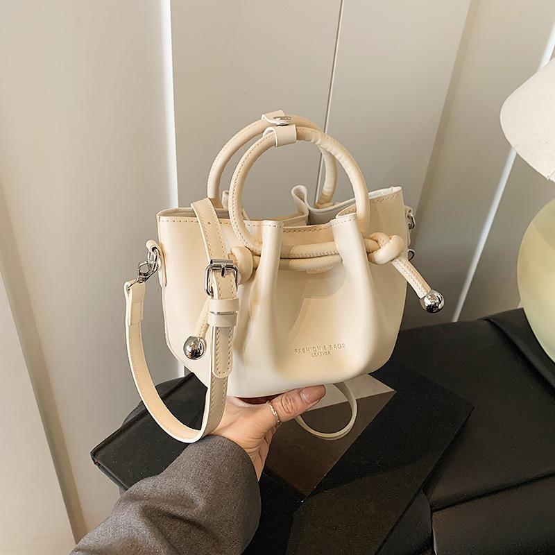 

Hand carry child and mother portable bucket bag 2025 new popular simple fashion niche shoulder messenger bag белый