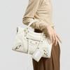 Spice girl rivet locomotive bag retro messenger leather large capacity tote bag niche leather handbag women