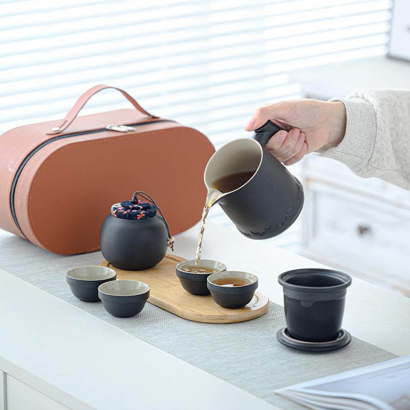 Ceramic Travel Tea Set, Portable Bag, Express Cup, One Pot, Four Cups, Tea Can, the Whole Set of Kung Fu Tea Set, Mountain Language Cup.