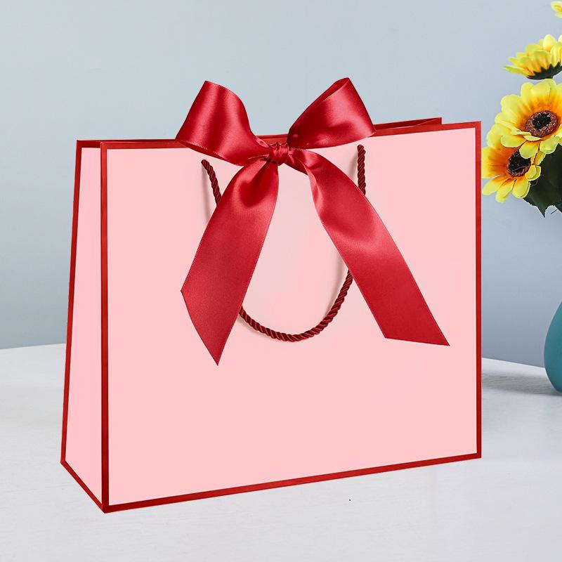 Geschenk-, Kosmetik- und Einkaufs-Papiertüten mit Schleifengriffen