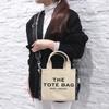 MARC JACOBS THE JACQUARD MINI TRAVELER TOTE MISC 263-WA.SA [produkt]