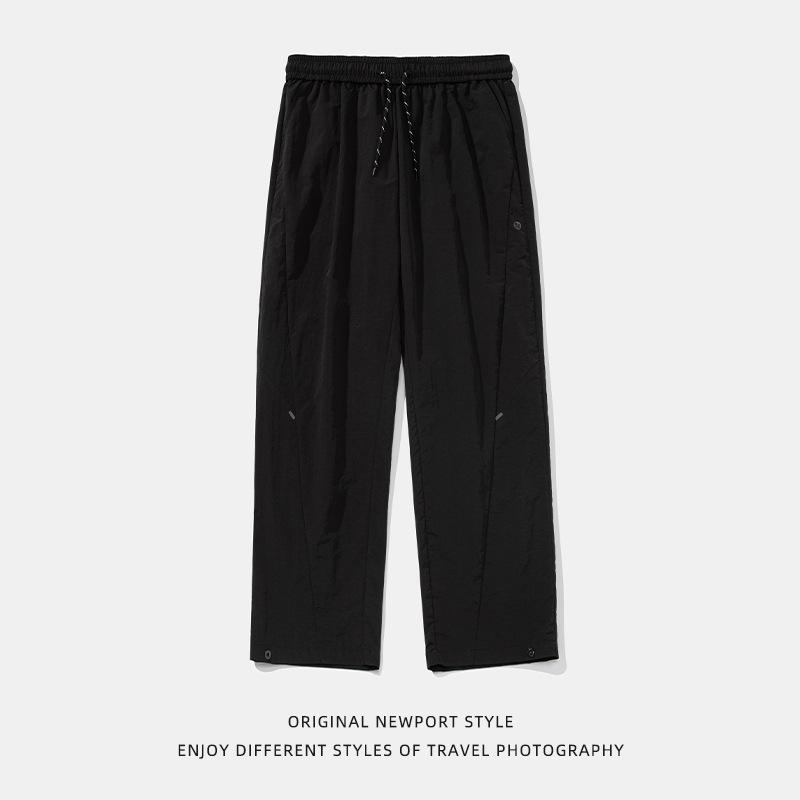 Outdoor tooling casual pants men's new anti-splashing split design long pants four-in-one buckle adjustment charging pants