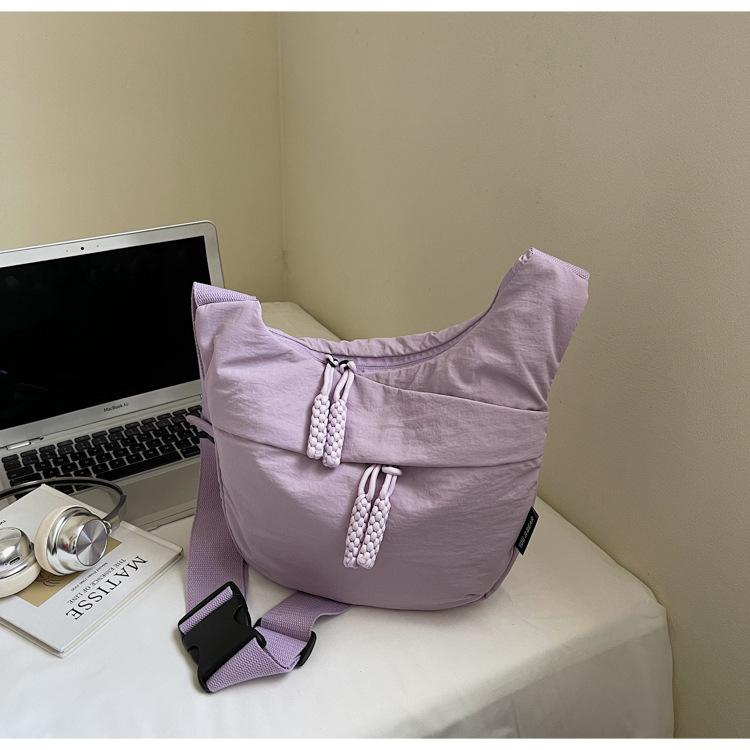 

Simple and large-capacity messenger bag women s bag new student small satchel shoulder cloth bag versatile dumpling bag