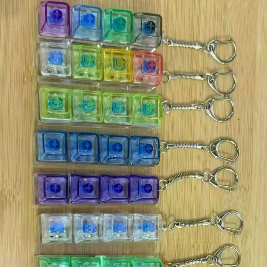 

Fingertip Rotating Gyro Keys Color Luminous Mechanical Keyboard Keys Decompression Test Shaft Key Toy Luminous model [with keychain]