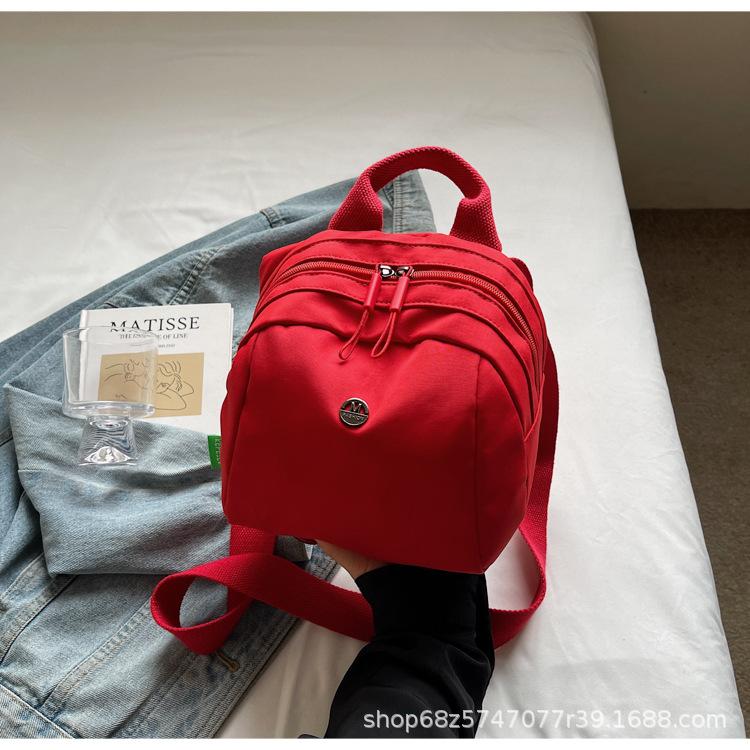 

Japan and South Korea 2025 new women s bags fashion casual nylon bags lightweight women s travel bags niche design messenger bags бордовый