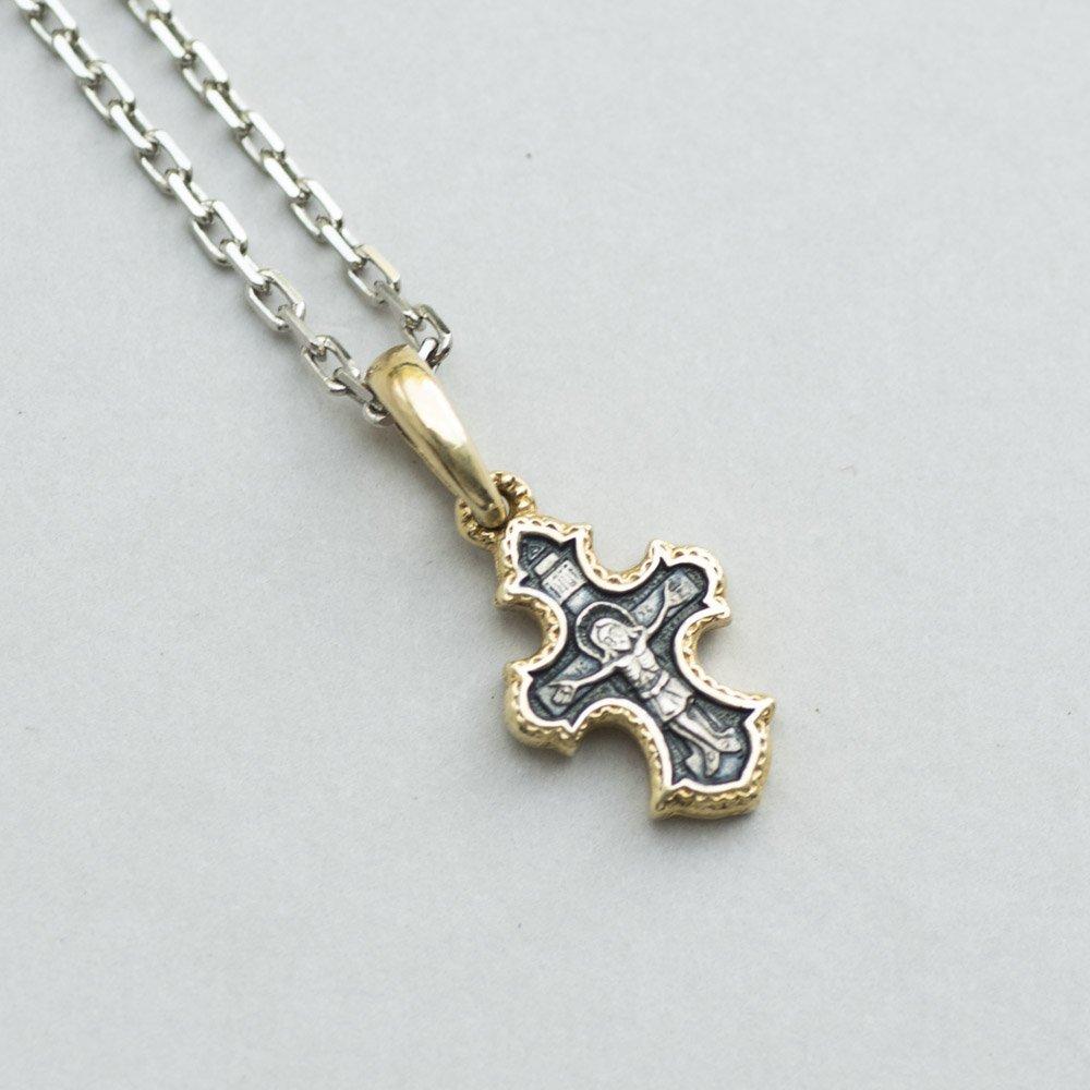 

Дитячий хрестик з позолотою. срібний