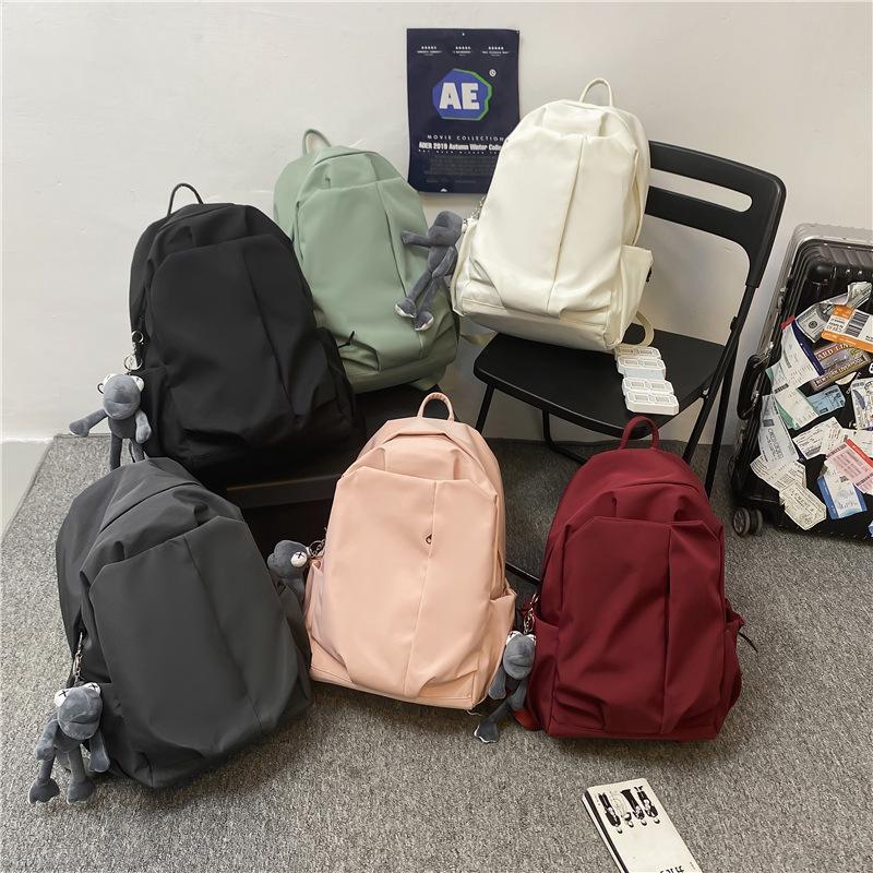 Schoolbag schoolbag female college student simple ins trendy cool large capacity backpack Korean version solid color light leisure travel backpack