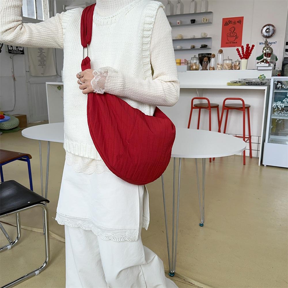 

22 simple niche commuter dumpling bag large capacity messenger bag shoulder bag solid color sports armpit bag бордовый