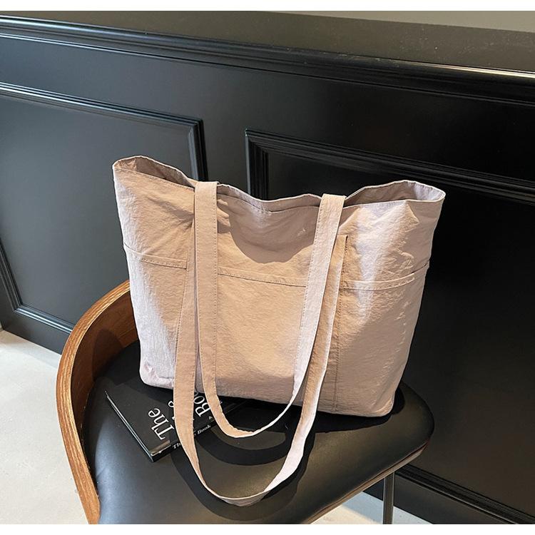 

Simple commuting versatile large-capacity tote bag, high-value commuting shoulder canvas bag when going to work and going out розовый