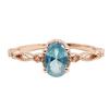 Anillo Yintai de Oro Rosa con Topacio Azul, Circonita Ovalada y Banda Trenzada - Exquisita Joyería de Lujo Ligero