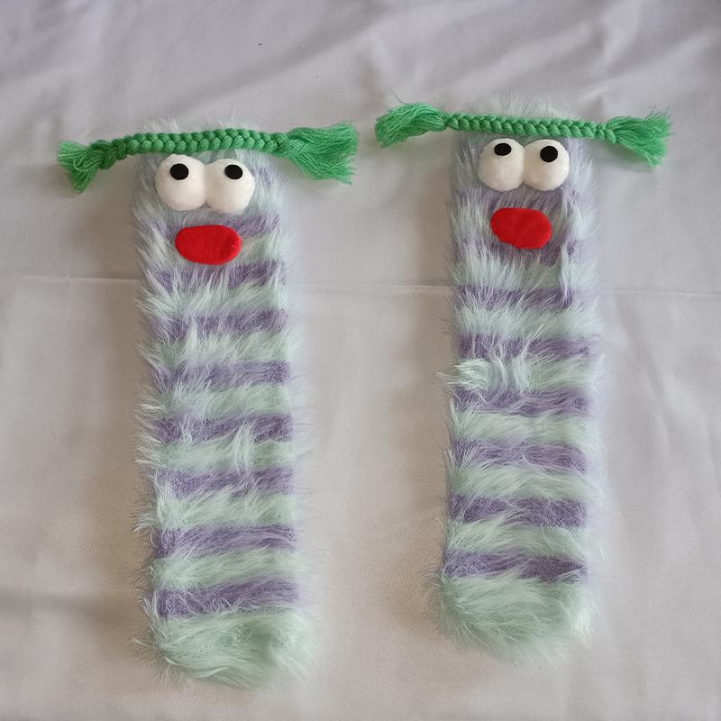 A pair of ugly cute funny socks women's medium tube socks autumn and winter floor sleeping socks coral fleece home hair fluffy c