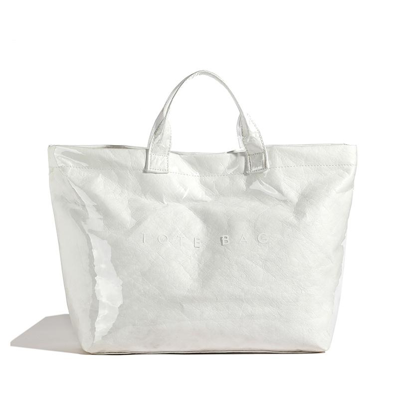 Glänzende DuPont-Papier- und PVC-Tragetasche mit kräftiger Beschriftung und wasserabweisendem Design
