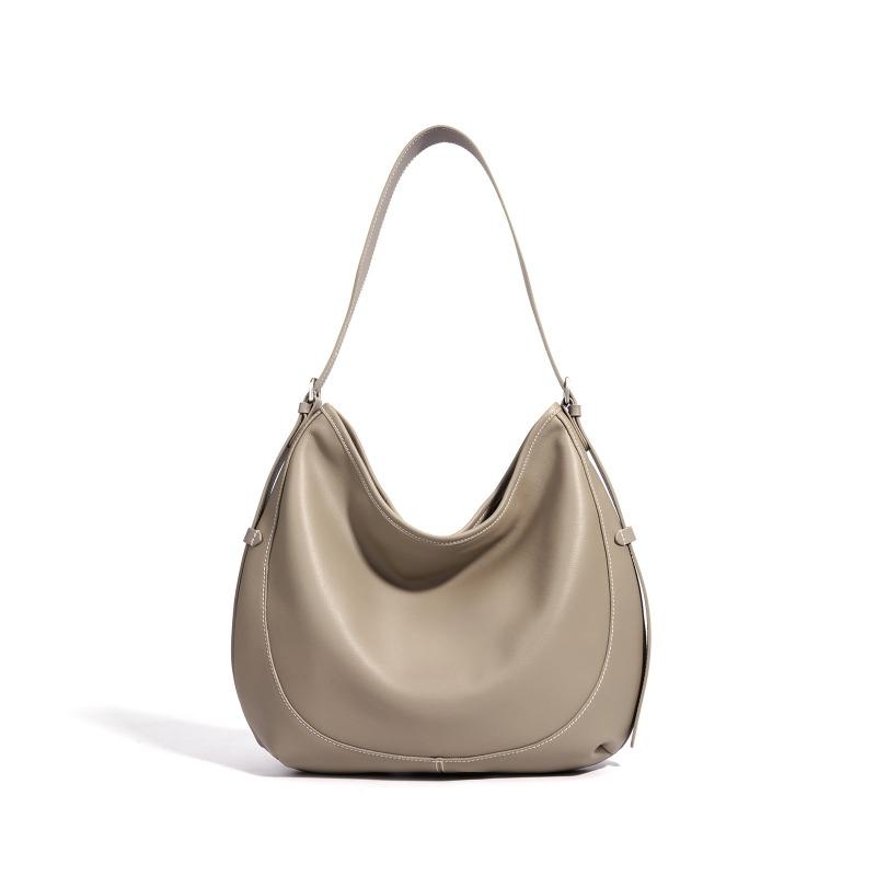 

Early spring new first-layer cowhide shoulder tote bag, European and American fashion design versatile commuter messenger bag bag