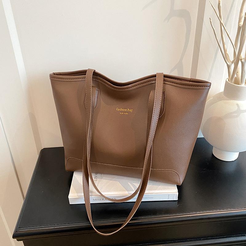 Simple and popular bucket bag women's bag new fashionable versatile commuter large-capacity tote shoulder bag