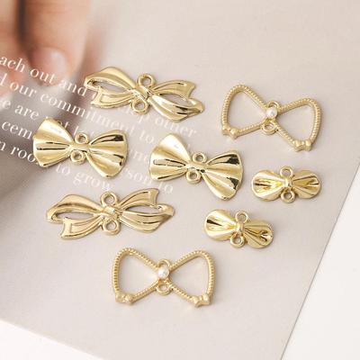 10 Stücke Metall Bogen Charm Anhänger DIY Schmuck Zubehör Erkenntnisse Zubehör Für Schmuck Machen
