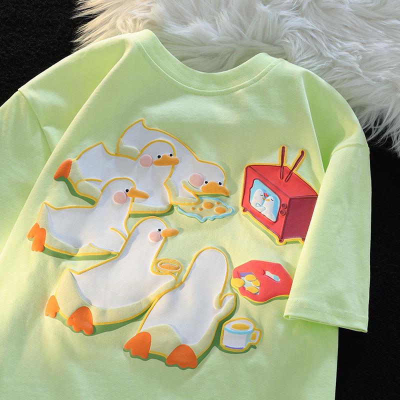 

Женская футболка свободного кроя из чистого хлопка с милым ретро-утиным принтом - Коллекция Лето 2025 M