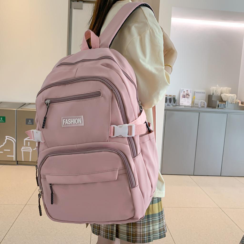 Schoolbag wholesale Korean version of casual large-capacity backpack, junior high school student schoolbag, solid color multi-layer Harajuku backpack