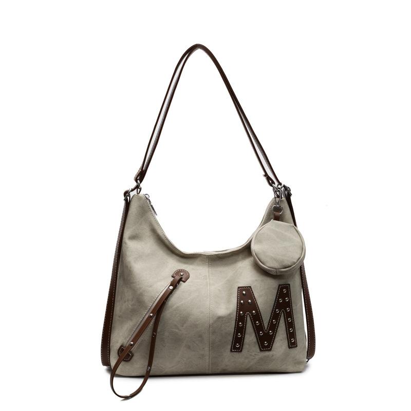 New women's bag niche fashion versatile backpack commuter shoulder messenger bag one pack three-purpose back