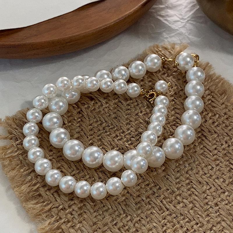 Künstliche Perle, rund, starkes Licht, Armband für Damen, französischer kleiner Duft, Hepburn-Stil, Schmuck, barock, Retro, elastische Seilperlen