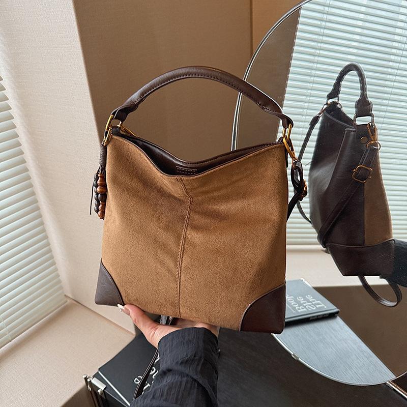 Leopard print bag women's 2025 new trendy autumn and winter niche portable bucket bag high-end exquisite messenger bag women's bag