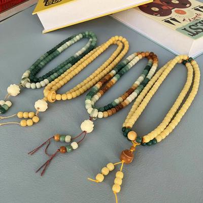 Barevný vyřezávaný náramek z kořene Bodhi Duobao se třemi vrstvami korálků posypaných lotosem a 108 dětských náramků Bodhi