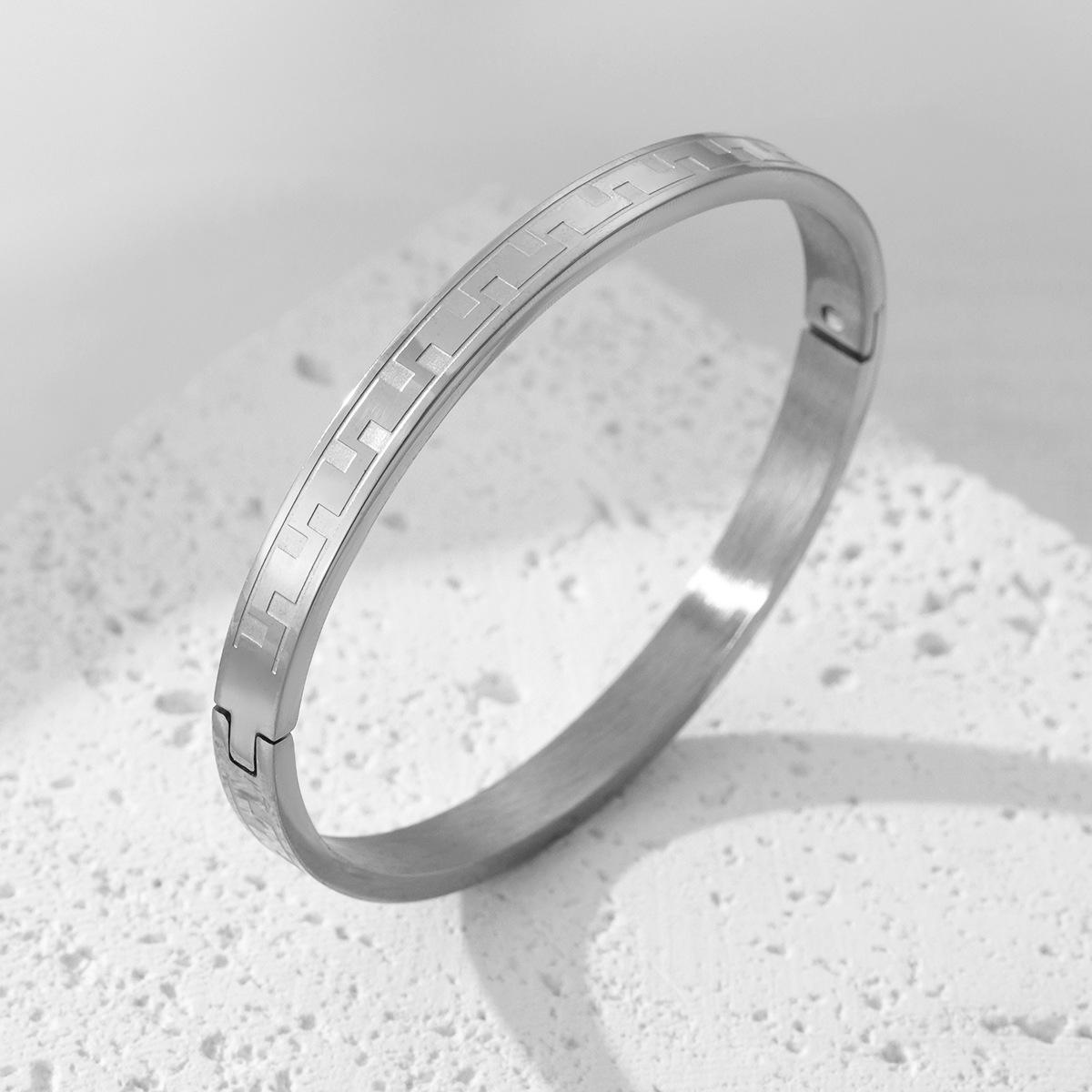 New titanium steel bracelet creative corrosion back word grid pattern buckle couple bracelet stainless steel jewelry